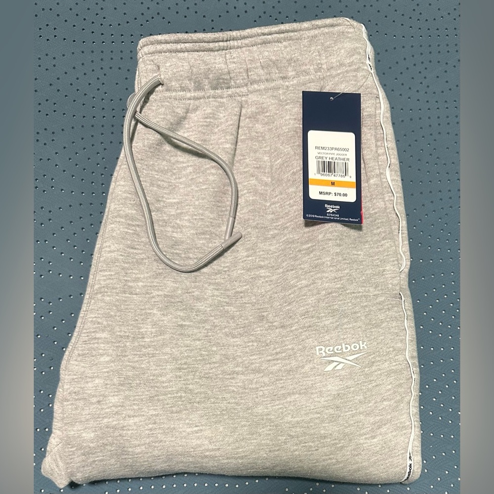 REEBOK Sweatpants, size medium 60%